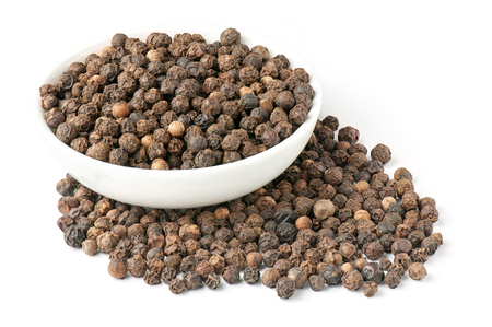Black pepper peas in a bowl isolated on white background. Full depth of field stacked image.の写真素材