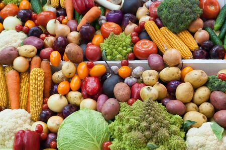 Assortment of fresh vegetables close up. Vegetables top view background.の写真素材