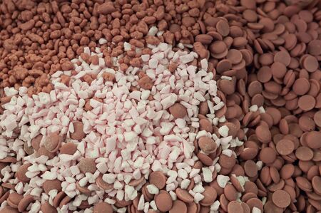 Luxury ruby and white chocolate top view. Chocolate background.の写真素材