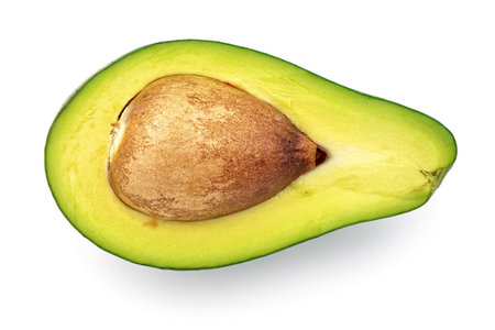 Half fresh avocado close-up isolated on white background. Top view.の写真素材