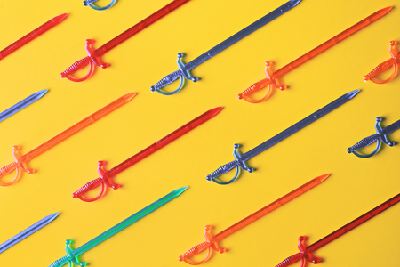 Flat lay set: skewers canapes on pastel backgrounds. Multi-colored sticks for a canape on a yellow background, top view. Colorful skewers for canape or snacks. Trendy colorful photo. Minimal style with colorful paper backdrop.の写真素材