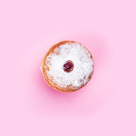 Glazed donut, top view on white background, isolated. Chocolate drawingの写真素材