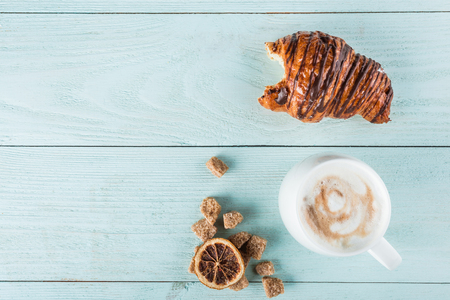 A coffee bite croissant, top view, advertising spaceの写真素材