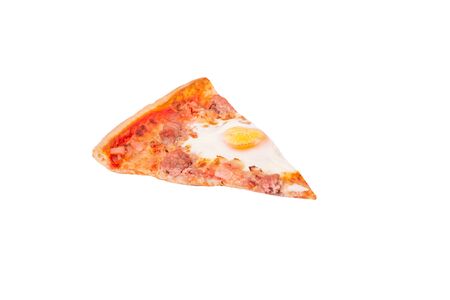A slice of pizza isolated on white background with clipping path, angle view. Delicious pizza with beef sausages, eggs and bacon or Brunch pizzaの写真素材