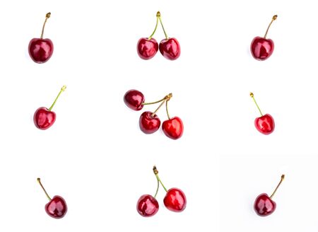 Composition of ripe cherries isolated on a white backgroundの写真素材