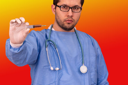 Medical man with stethoscope, eyeglasses and protection clothing of Coronavirus contamination,...