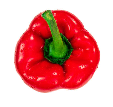 Red capsicum or red bell pepper with water drops, isolated on white background. Fresh raw vegetable, top viewの写真素材