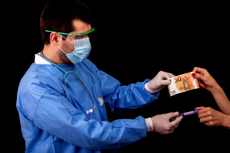 Female patient buys the vaccine against the new Covid-19 virus from the doctor with fifty euros,...
