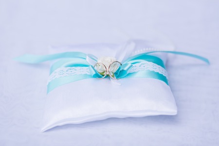 Image of wedding rings on the pillowの写真素材