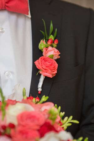 big nice wedding bouquet in groom handの写真素材