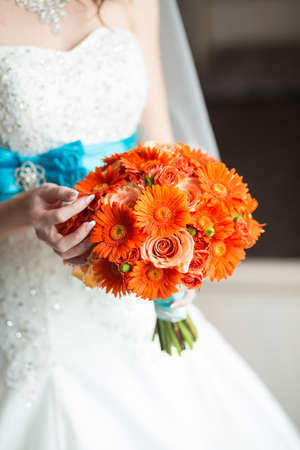 wedding bouquet in hands of the brideの写真素材