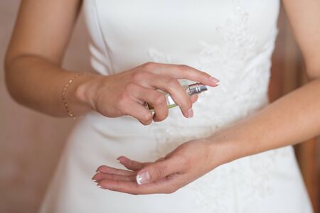 Wedding veil, perfume bottle and a garterの写真素材