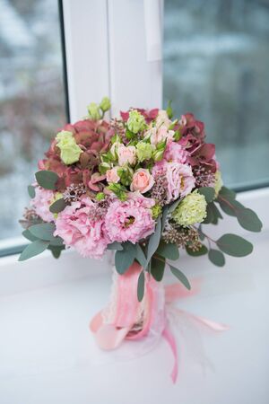 Colorful bridal beautiful bouquet of different flowersの写真素材