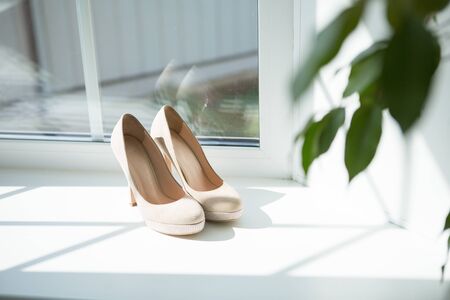 White Wedding shoes on the gatherings of the brideの写真素材