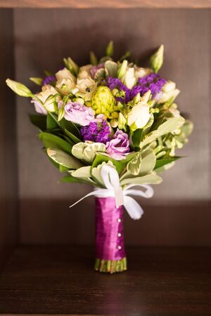 Colorful bridal beautiful bouquet of different flowersの写真素材