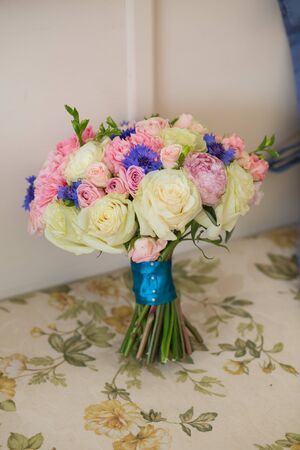 Colorful bridal beautiful bouquet of different flowersの写真素材