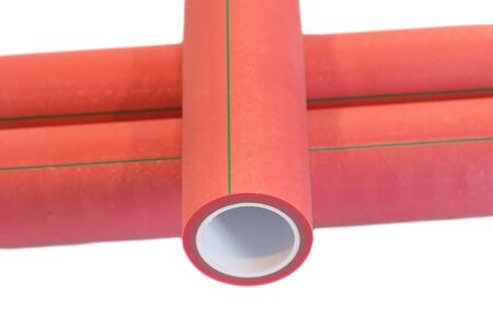 Red Polypropylene pipes on white background close upの写真素材