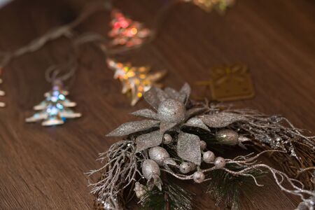 Christmas silver wreath on the wooden backgroundの写真素材