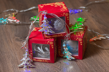 Christmas background - glass balls,  garland and giftsの写真素材