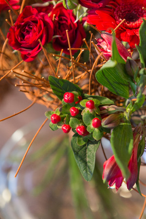 Beautiful flower bouquets on a light background of a brickの写真素材