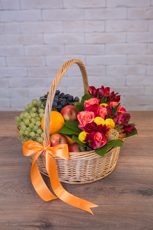 Beautiful flower bouquets on a light background of a brickの写真素材