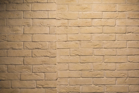 old yellow brick wall texture background close up