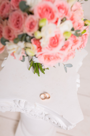 Two wedding rings and spring blossoms. Wedding concept.の写真素材