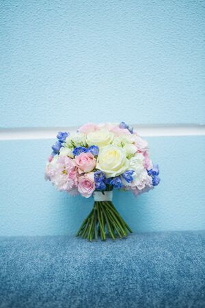 Colorful bridal beautiful bouquet of different flowersの写真素材