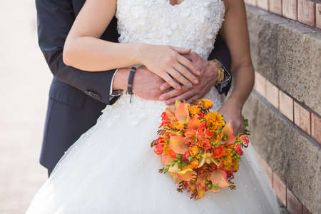 wedding bouquet in hands of the brideの写真素材