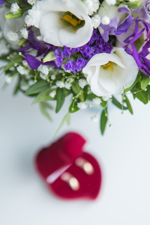 Two wedding rings and spring blossoms. Wedding concept.の写真素材
