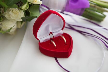 Two wedding rings and spring blossoms. Wedding concept.の写真素材