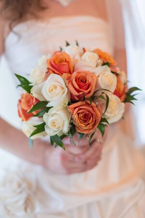 wedding bouquet in hands of the brideの写真素材