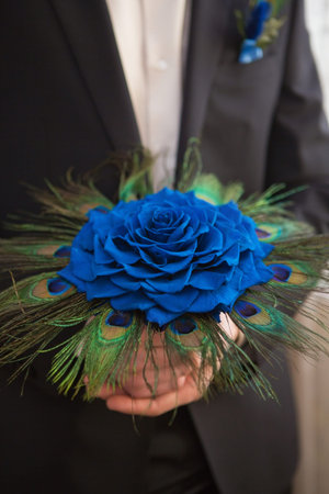 big nice wedding bouquet in groom handの写真素材