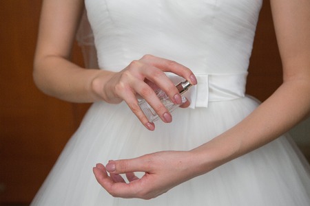 Wedding veil, perfume bottle and a garterの写真素材