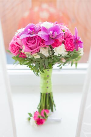 Bridal beautiful romantic bouquet of various flowersの写真素材