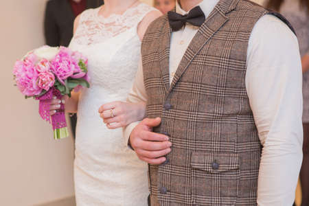 wedding bouquet in hands of the brideの写真素材