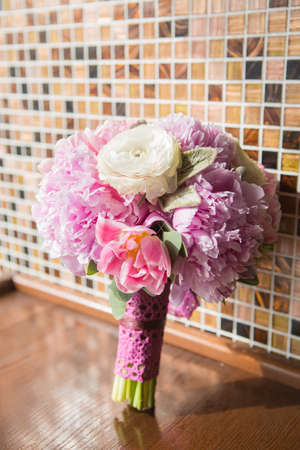 Bridal beautiful romantic bouquet of various flowersの写真素材