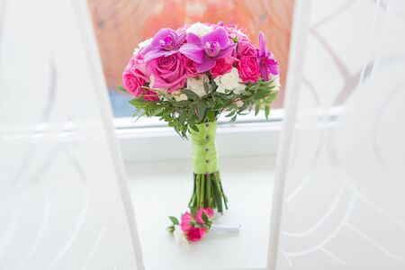 Bridal beautiful romantic bouquet of various flowersの写真素材