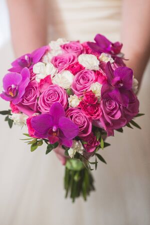 wedding bouquet in hands of the brideの写真素材