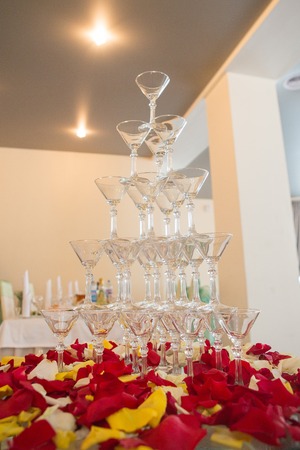 Champagne in glasses with fresh cherry on table - party backgroundの写真素材