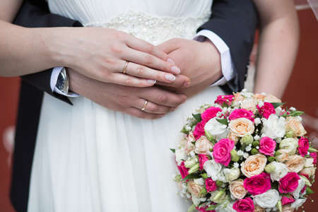 wedding bouquet in hands of the brideの写真素材