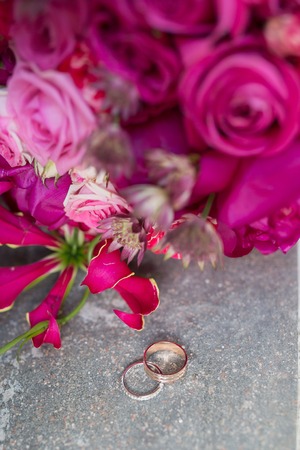 Two wedding rings and spring blossoms. Wedding concept.の写真素材
