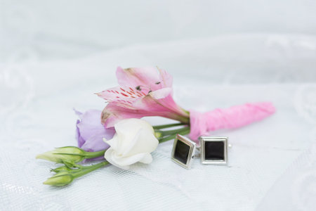 Beautiful wedding boutonniere of varios flowers on nice background