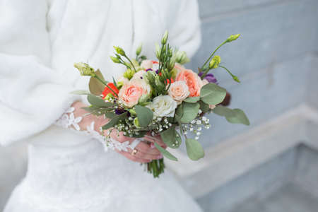 wedding bouquet in hands of the brideの写真素材