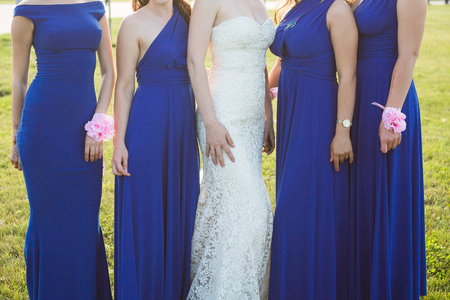 Close up of bride and bridesmaids bouquetsの写真素材