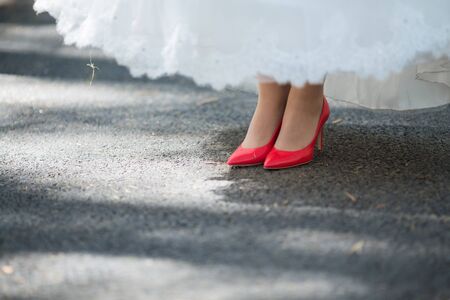 Red Wedding shoes on the gatherings of the brideの写真素材