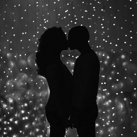 Romantic couple kissing silhouette on the light background B&Wの写真素材