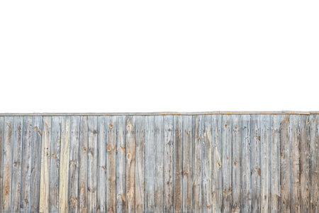 Wooden grey fence background isolated over white background. Fence texture conceptの写真素材