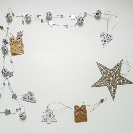 Top view of Christmas accessories on white background with copyspace, flat layの写真素材