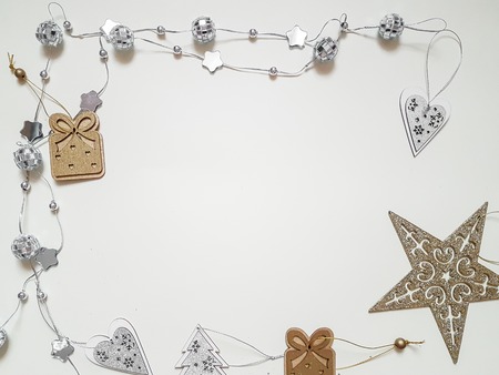 Top view of Christmas accessories on white background with copyspace, flat layの写真素材
